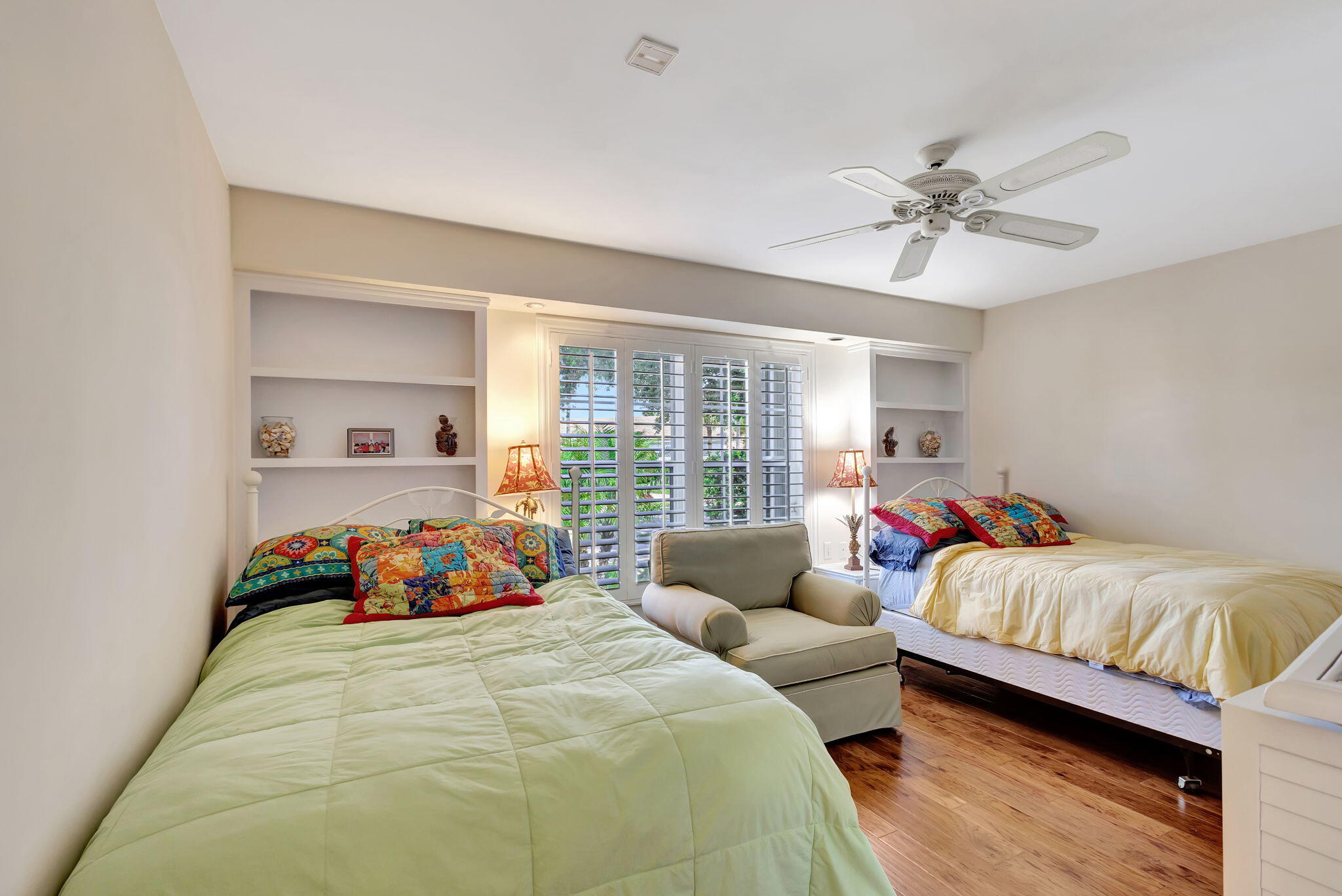 3790 Shearwater Drive Jupiter, FL 33477 - Photo 19 of 30 a bedroom with a bed and a window