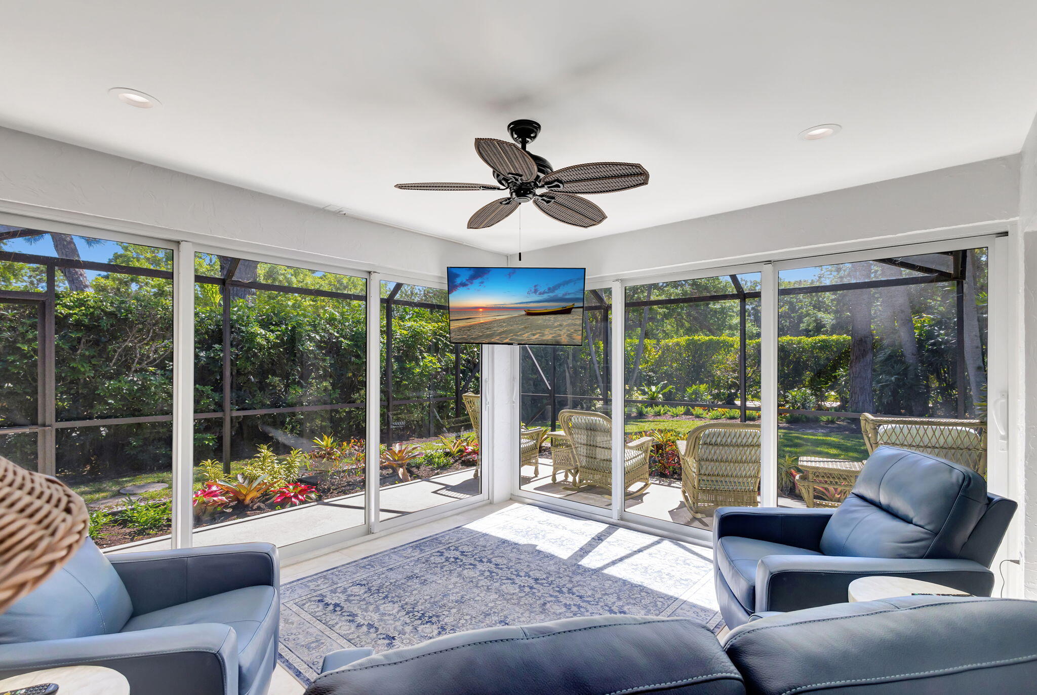 3790 Shearwater Drive Jupiter, FL 33477 - Photo 23 of 30 a living room with furniture and a large window