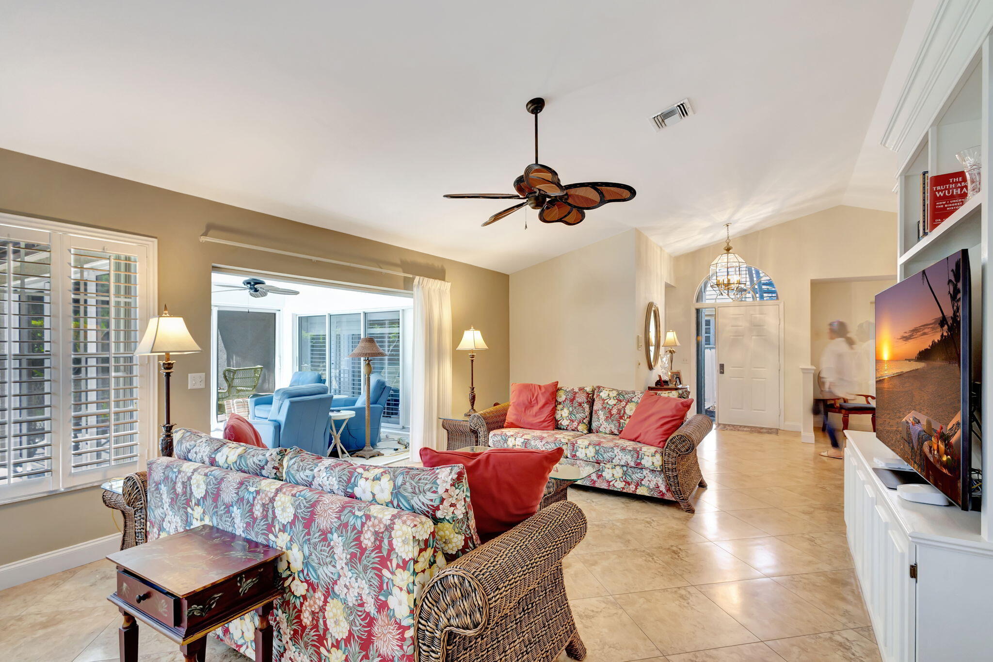 3790 Shearwater Drive Jupiter, FL 33477 - Photo 5 of 30 a living room with furniture and a flat screen tv