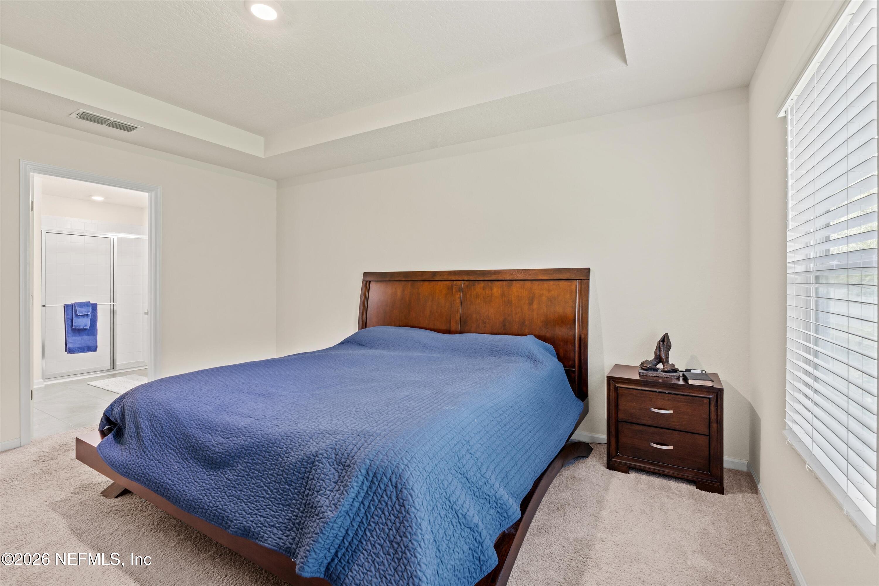 91 Rivertown Road Palm Coast, FL 32137 - Photo 17 of 36 18-Primary Bedroom