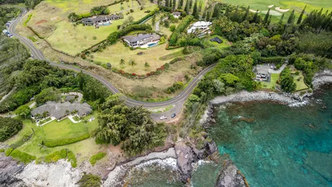 a view of swimming pool with a yard
