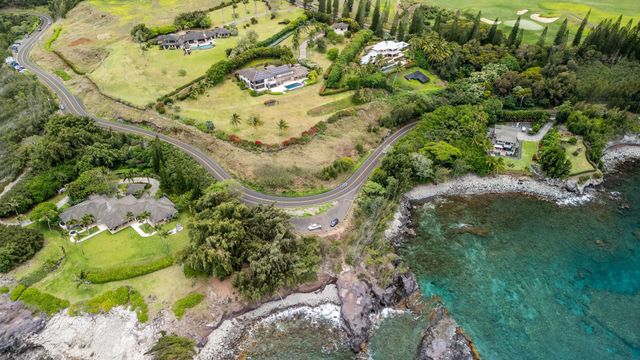 a view of swimming pool with a yard