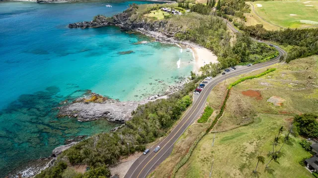 a view of a lake with a yard