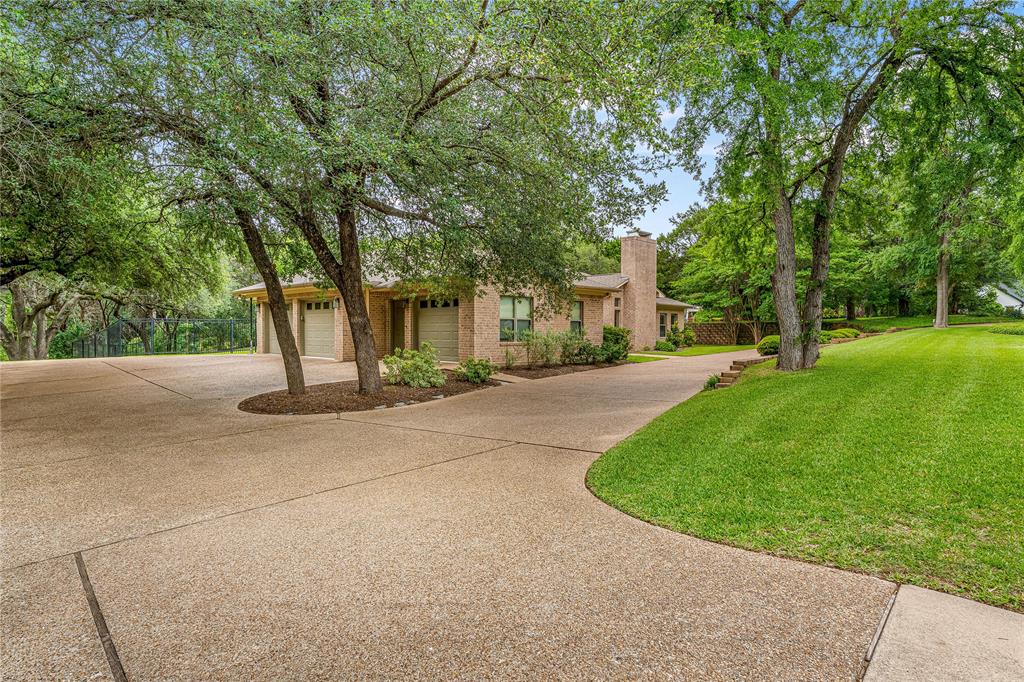 3201 Edward Drive Waco, TX 76708 - Photo 2 of 40 a view of a park with large trees
