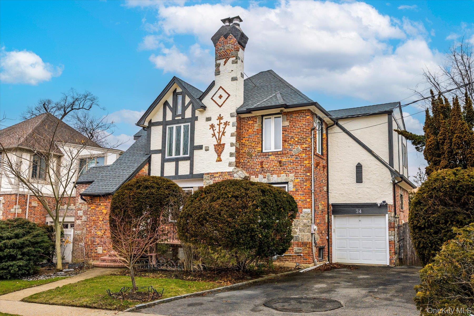34 Reyam Road Lynbrook, NY 11563 - Photo 2 of 38 a front view of a house