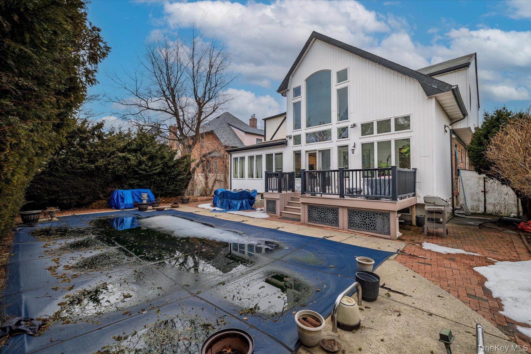 34 Reyam Road Lynbrook, NY 11563 - Photo 28 of 38 a view of a house with backyard and sitting area