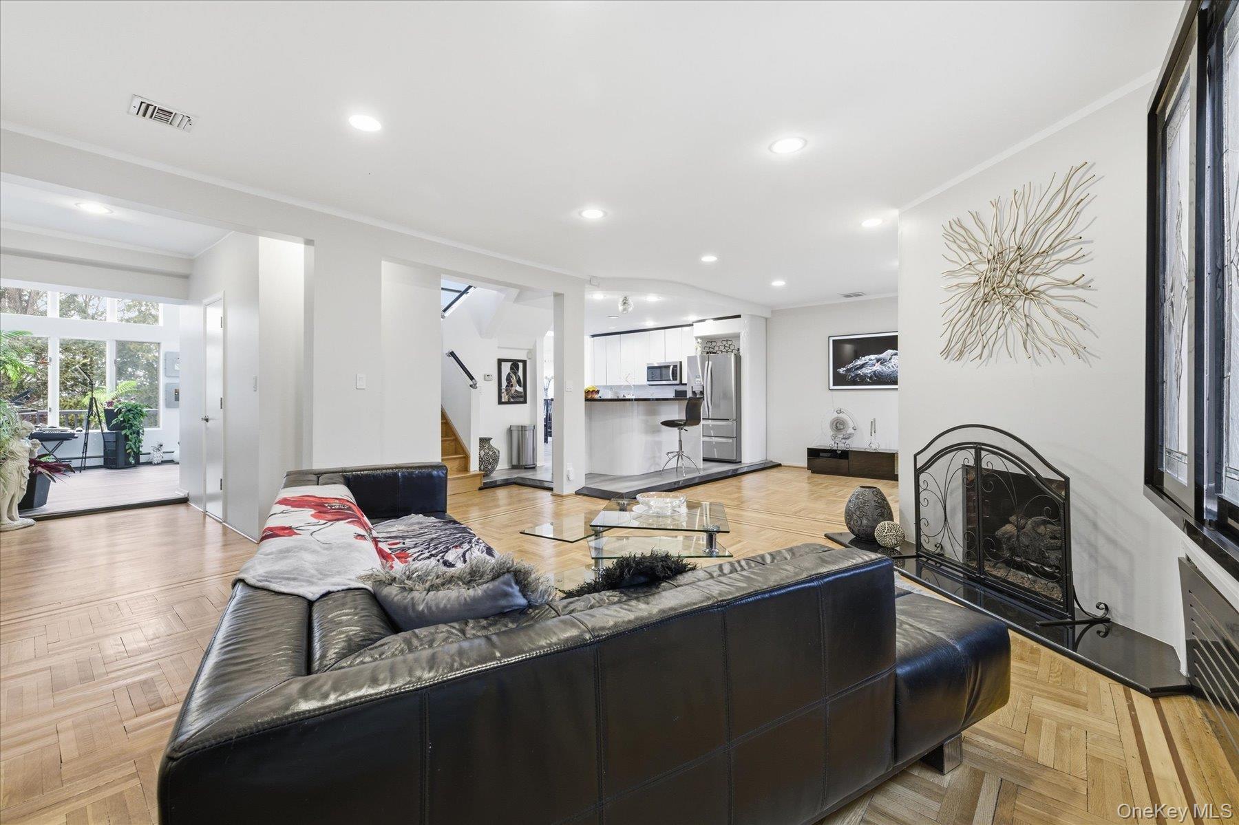 34 Reyam Road Lynbrook, NY 11563 - Photo 5 of 38 a living room with furniture and a table