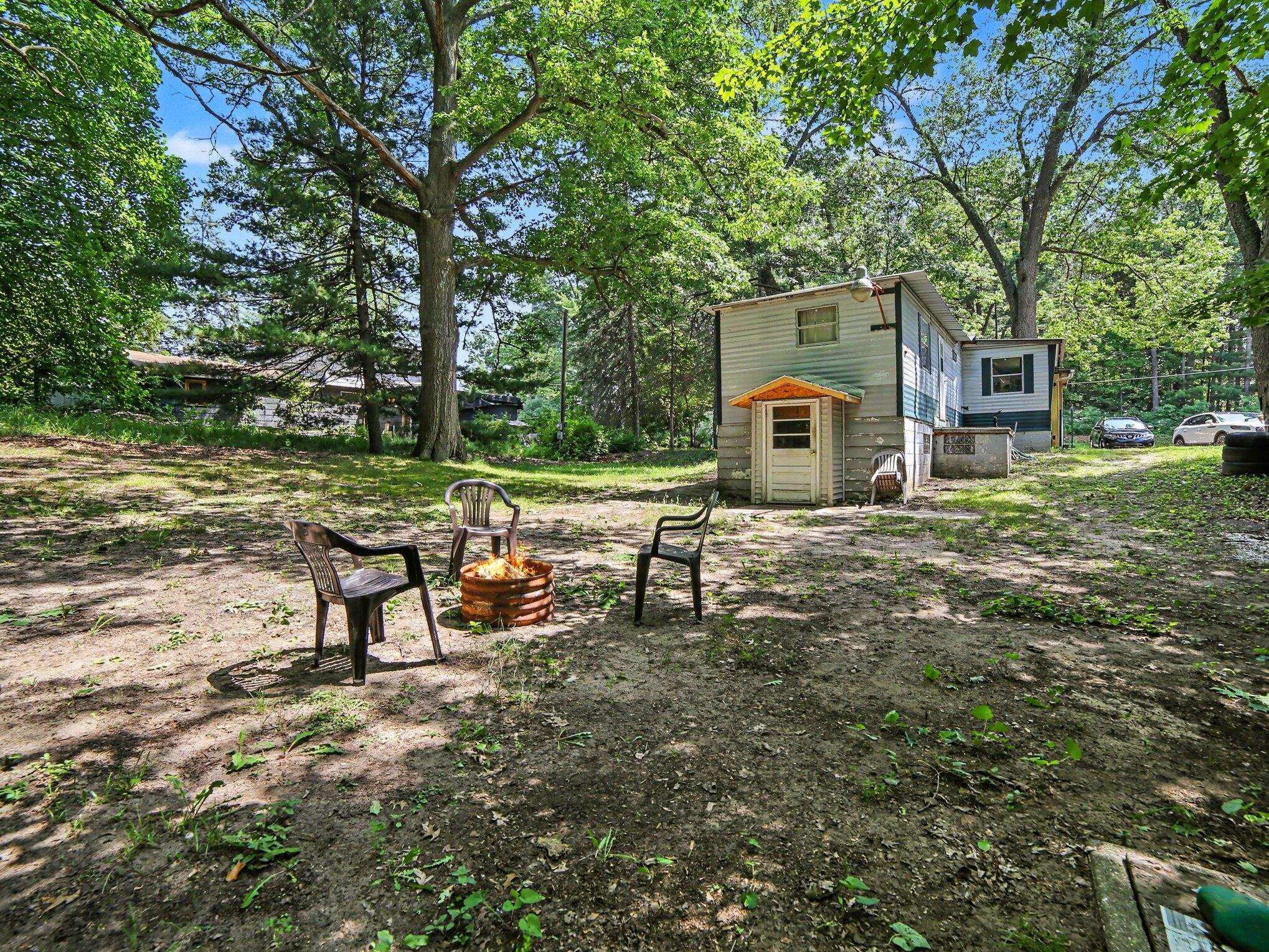 5648 West Johnson Road Ludington, MI 49431 - Photo 4 of 22 Back of House/ backyard\