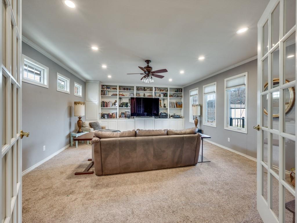 9835 Estate Lane Dallas, TX 75238 - Photo 11 of 25 Secondary living room with ornamental molding, ceiling fan, plenty of natural light, recessed lighting, and french doors