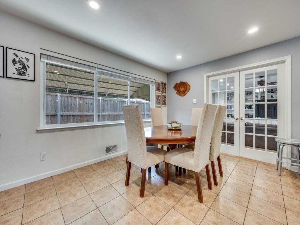 9835 Estate Lane Dallas, TX 75238 - Photo 8 of 25 Tiled dining area with french doors and recessed lighting