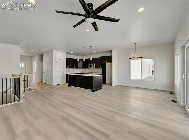 a view of a kitchen with a sink and dishwasher