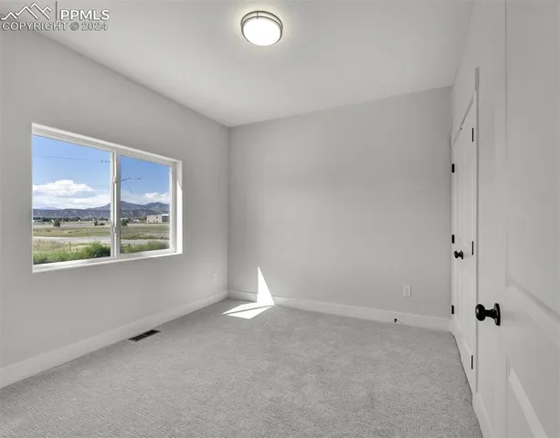 a view of a big room with window