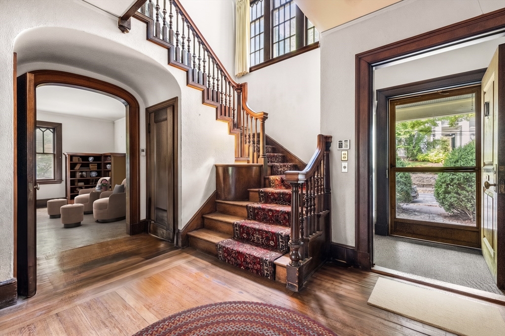 16 Kennard Road Brookline, MA 02445 - Photo 2 of 10 a view of a livingroom with furniture and staircase