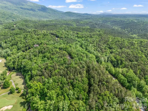 a view of a green yard in a field