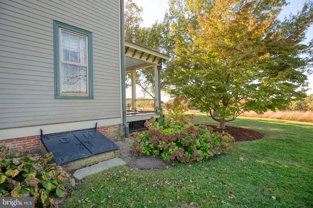 a view of a house with garden