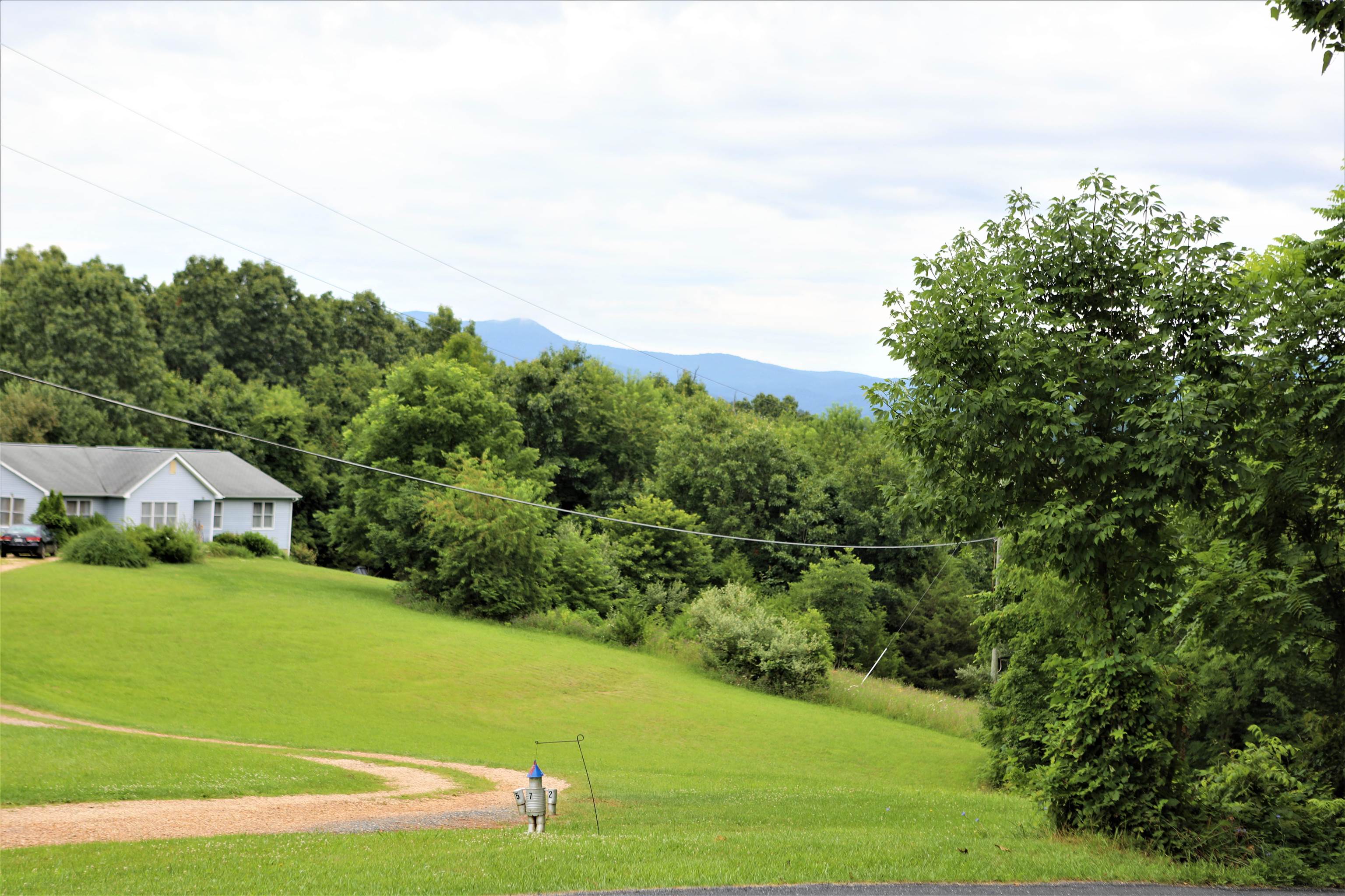 573 Round Hill School Road Fort Defiance, VA 24437 - Photo 27 of 65 a view of a field with an trees