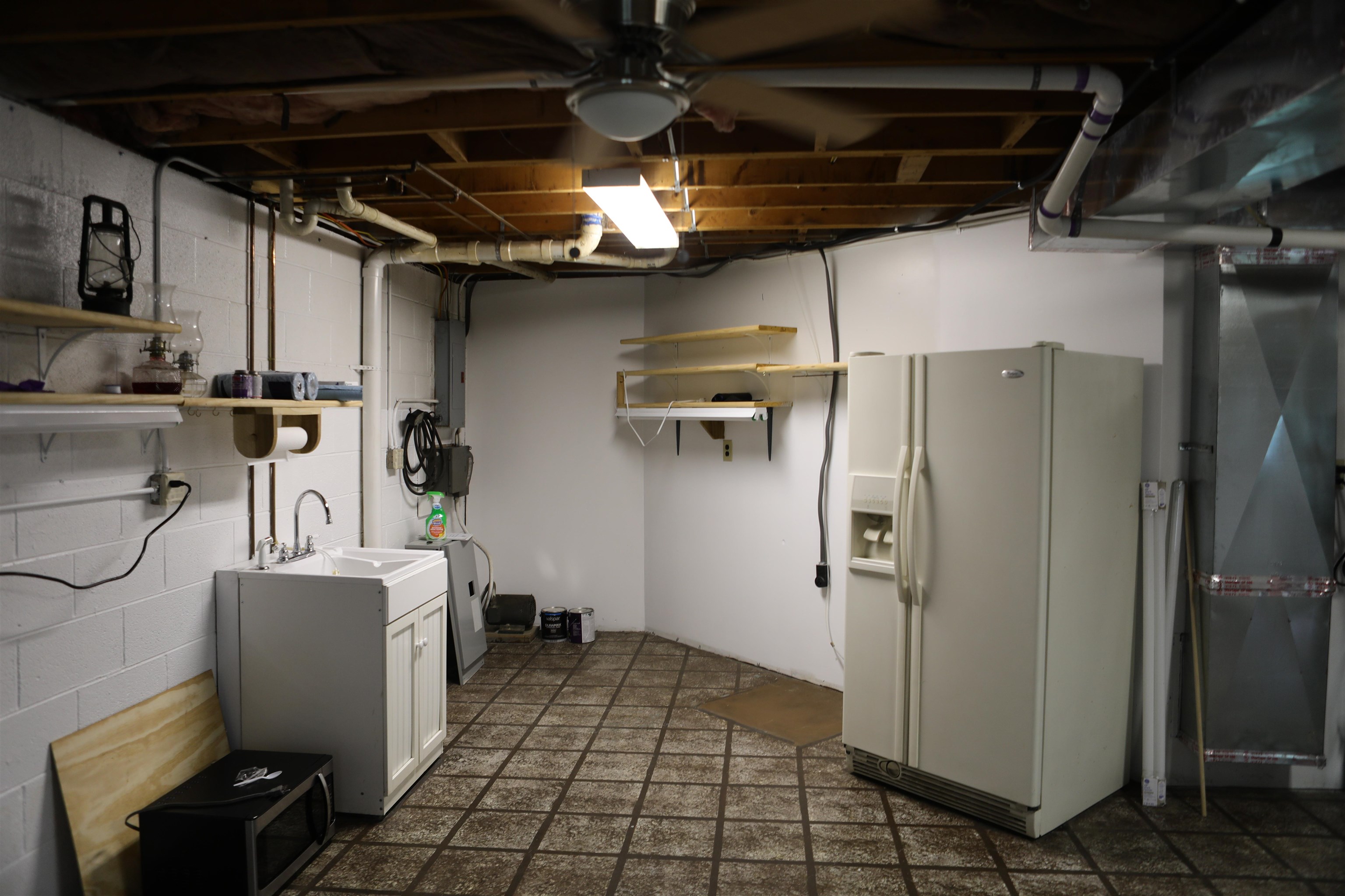 573 Round Hill School Road Fort Defiance, VA 24437 - Photo 54 of 65 a room with storage and utility