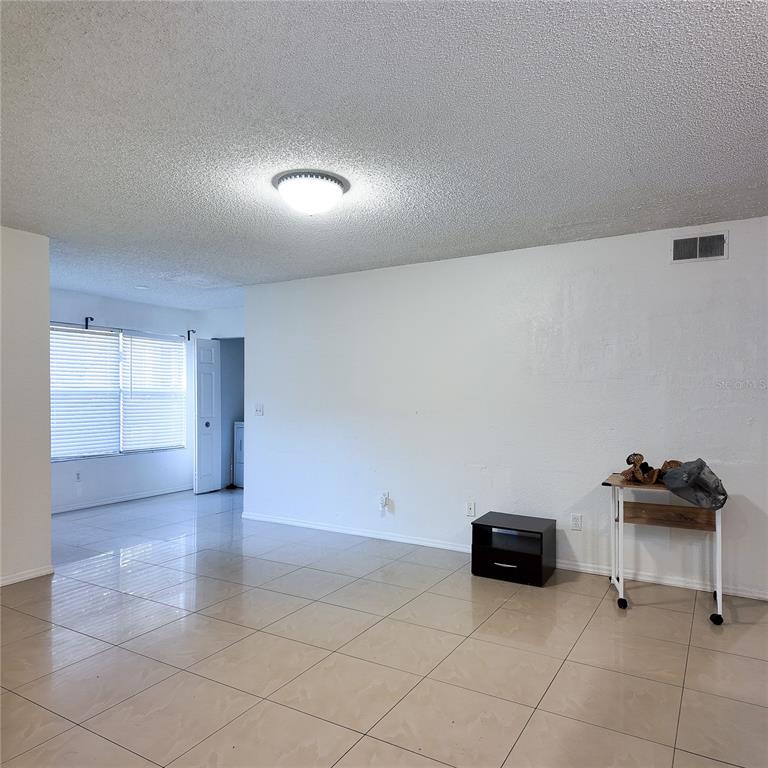 5152 Conroy Road, Unit 1317 Orlando, FL 32811 - Photo 10 of 21 a view of a livingroom with furniture