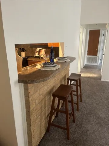 a room with a table and chairs