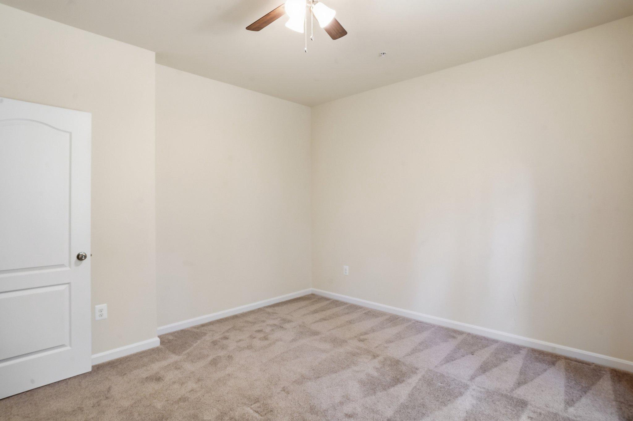 4755 South Polling House Road Harwood, MD 20776 - Photo 8 of 36 Spacious 3rd bedroom with soft natural light.