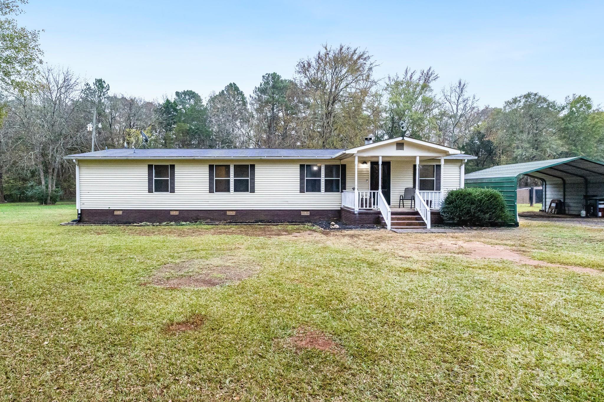 2174 Gregg Road Rock Hill, SC 29730 - Photo 2 of 36 a front view of house with yard and green space