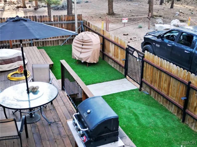a view of a livingroom with furniture and a fireplace