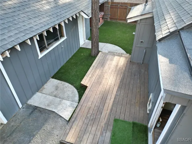 a kitchen with a counter space a sink appliances and cabinets