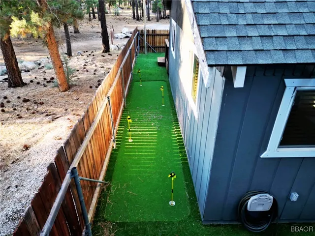a kitchen with stainless steel appliances a sink and cabinets
