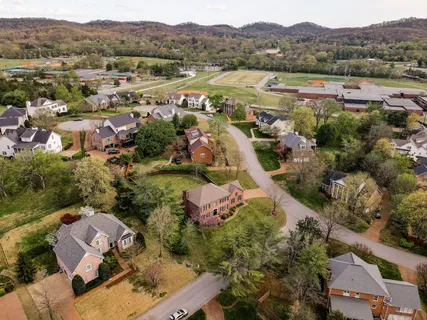 an aerial view of a city with lots of residential buildings