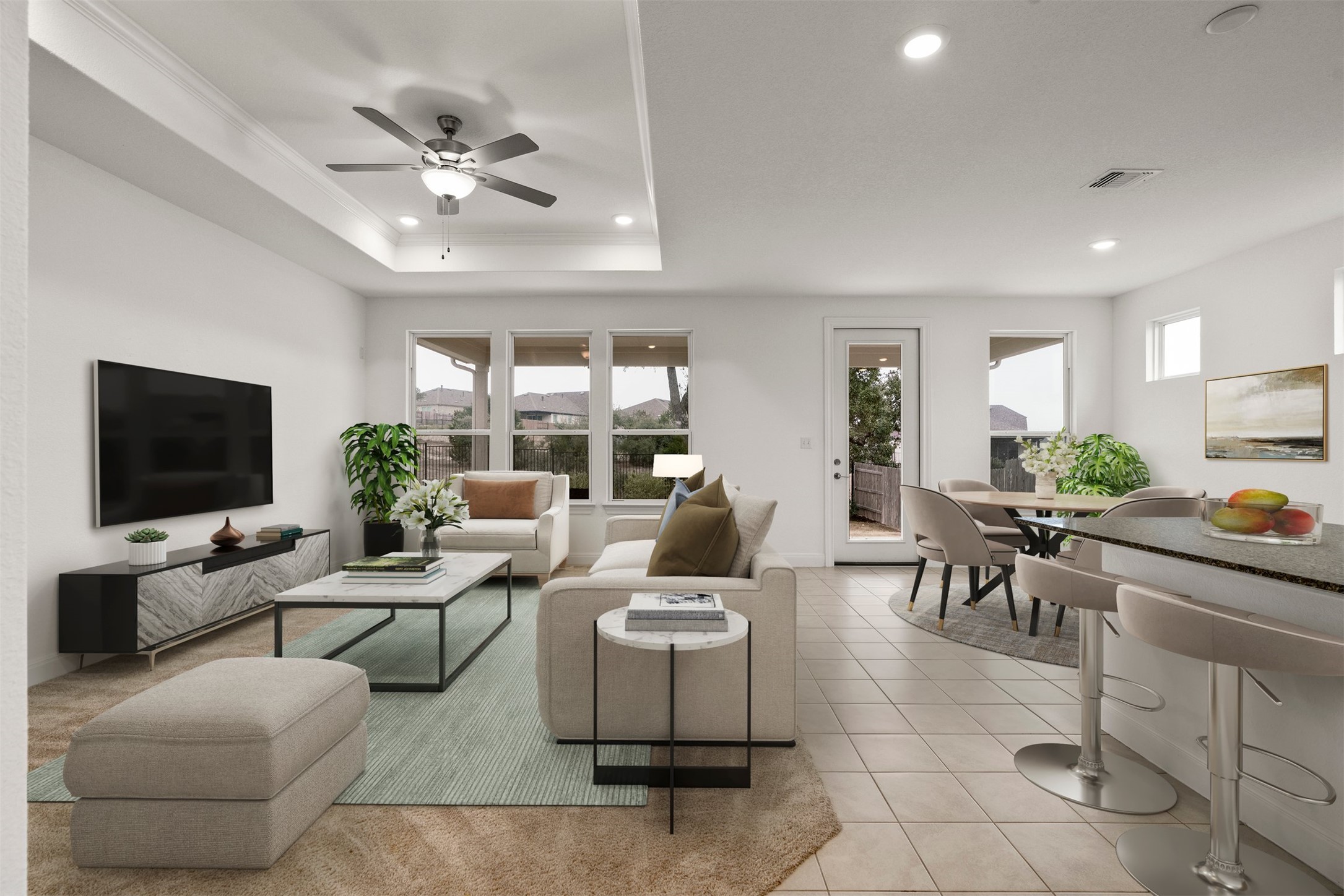The living room centers the home with an open layout that connects easily to the kitchen and dining area, making everyday routines feel effortless and connected *Virtually staged