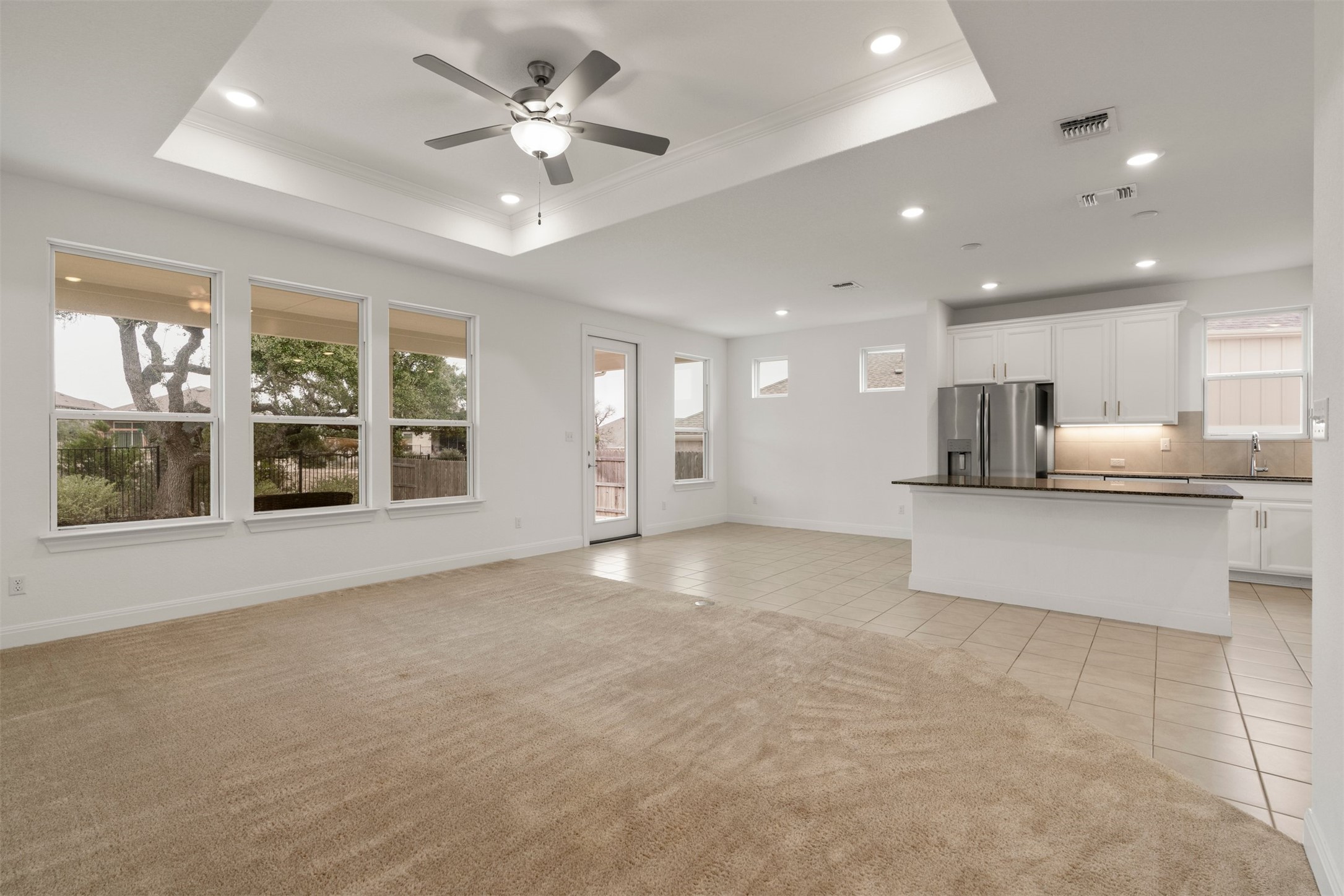 302 Barn Hill Loop Dripping Springs, TX 78620 - Photo 40 of 40 The living room’s position at the heart of the floor plan allows it to function as both a gathering space and a comfortable place to wind down at the end of the day
