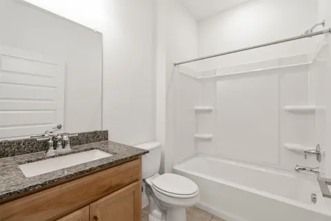 a view of a house with a garage