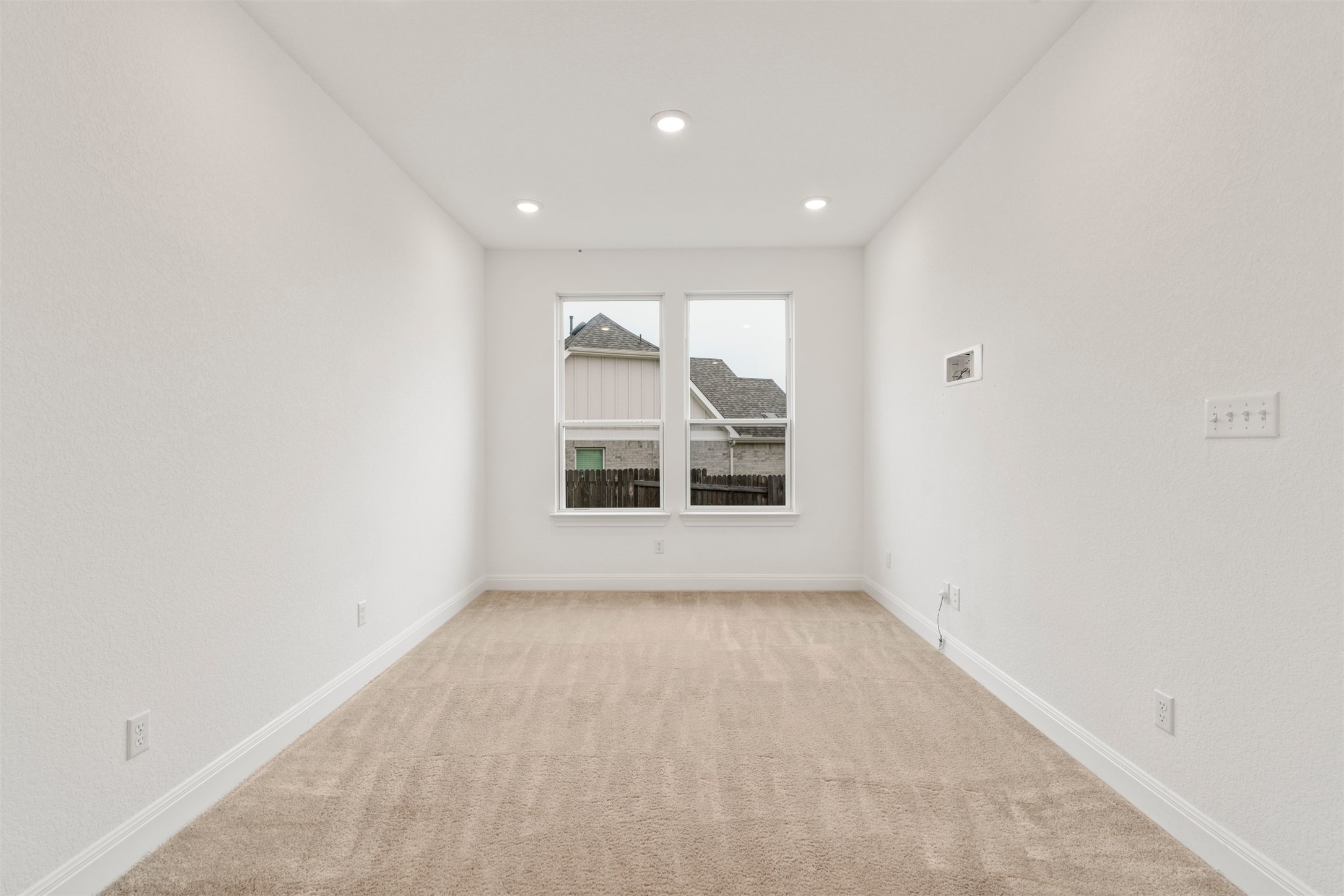 302 Barn Hill Loop Dripping Springs, TX 78620 - Photo 25 of 40 an empty room with a window