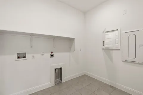 a view of a house with snow on the background