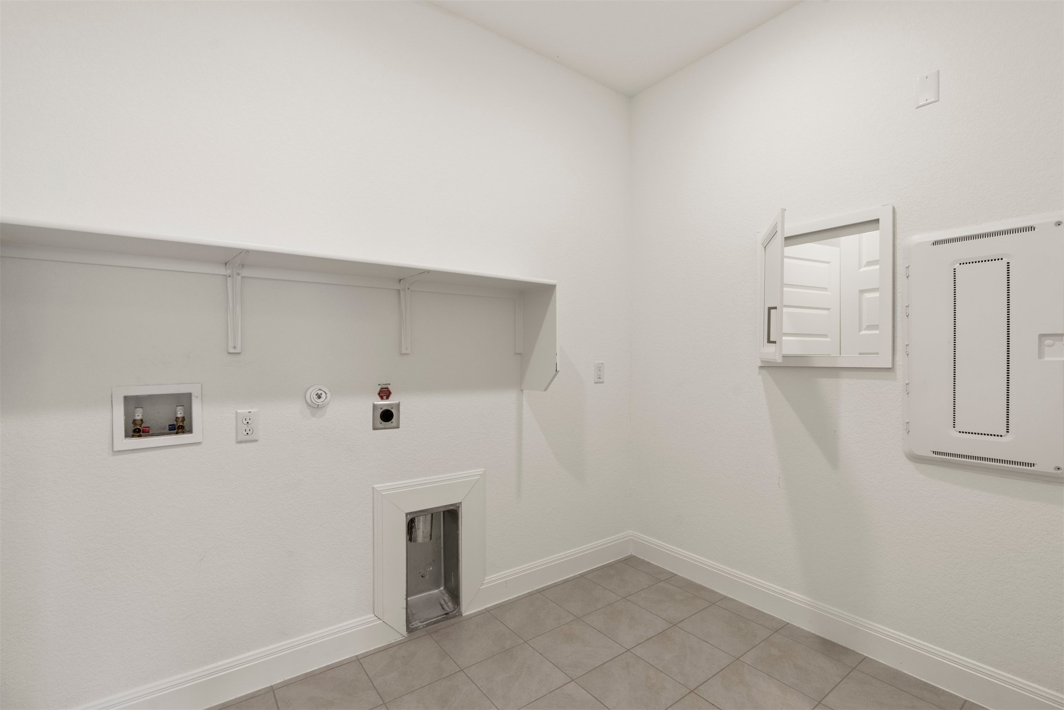 302 Barn Hill Loop Dripping Springs, TX 78620 - Photo 25 of 40 The huge laundry room offers all the space you need to tackle day to day chores