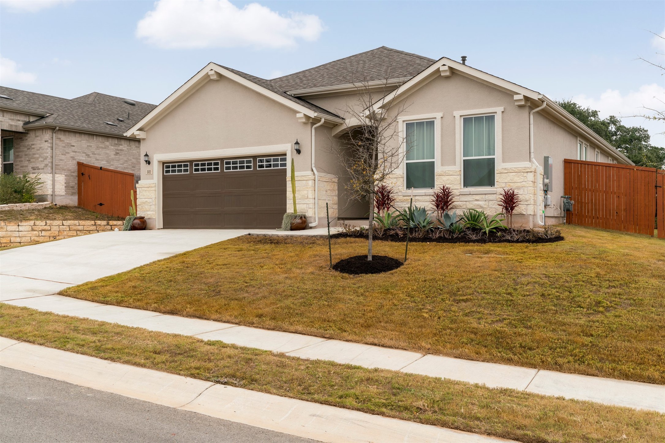 302 Barn Hill Loop Dripping Springs, TX 78620 - Photo 31 of 40 a front view of house with yard