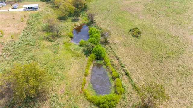 a view of a yard with an outdoor space and seating