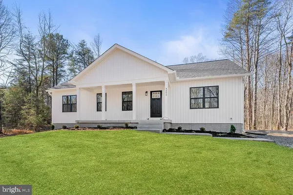 a front view of house with yard
