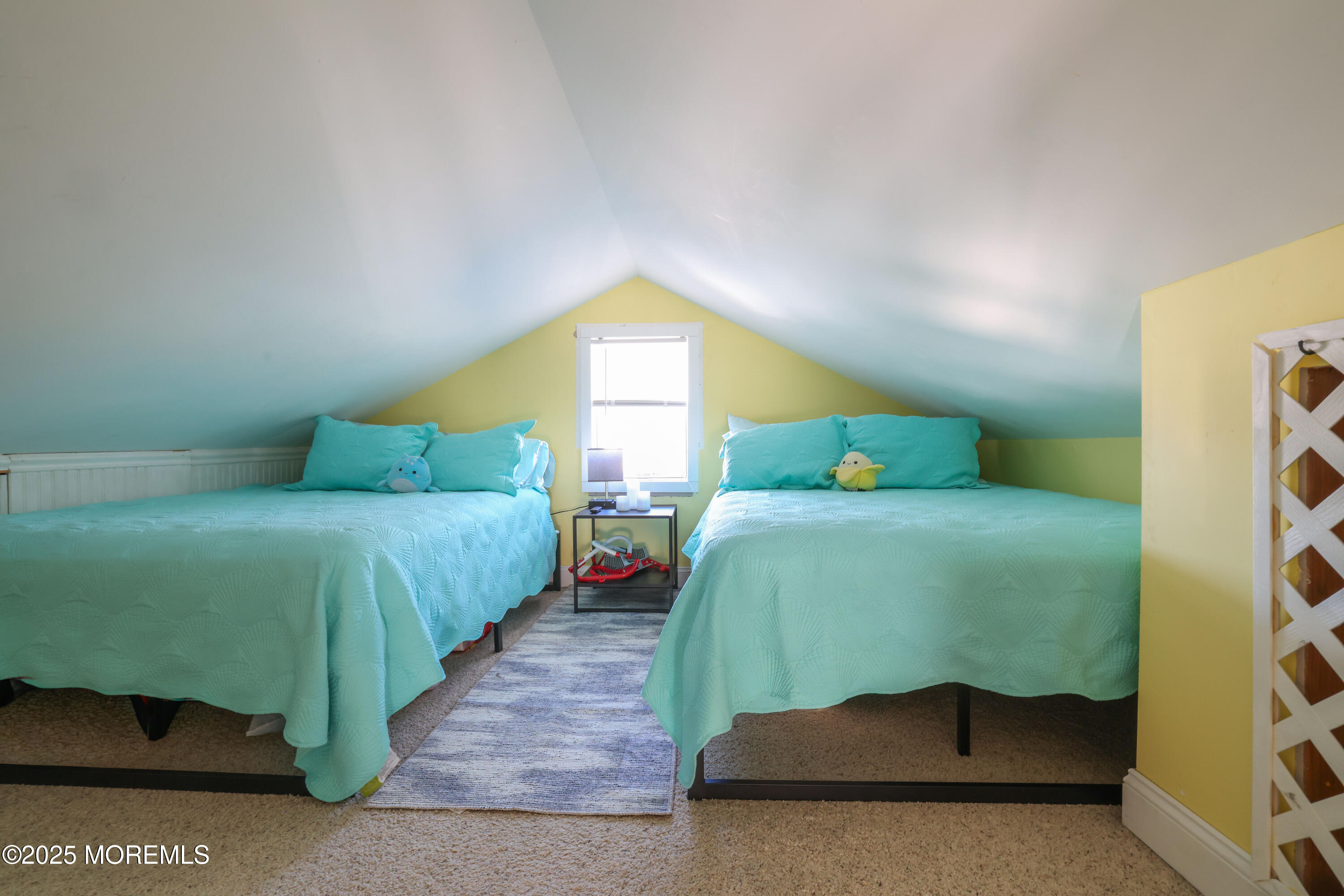25 B Carroll Avenue Tuckerton, NJ 08087 - Photo 18 of 27 a bedroom with a bed and window
