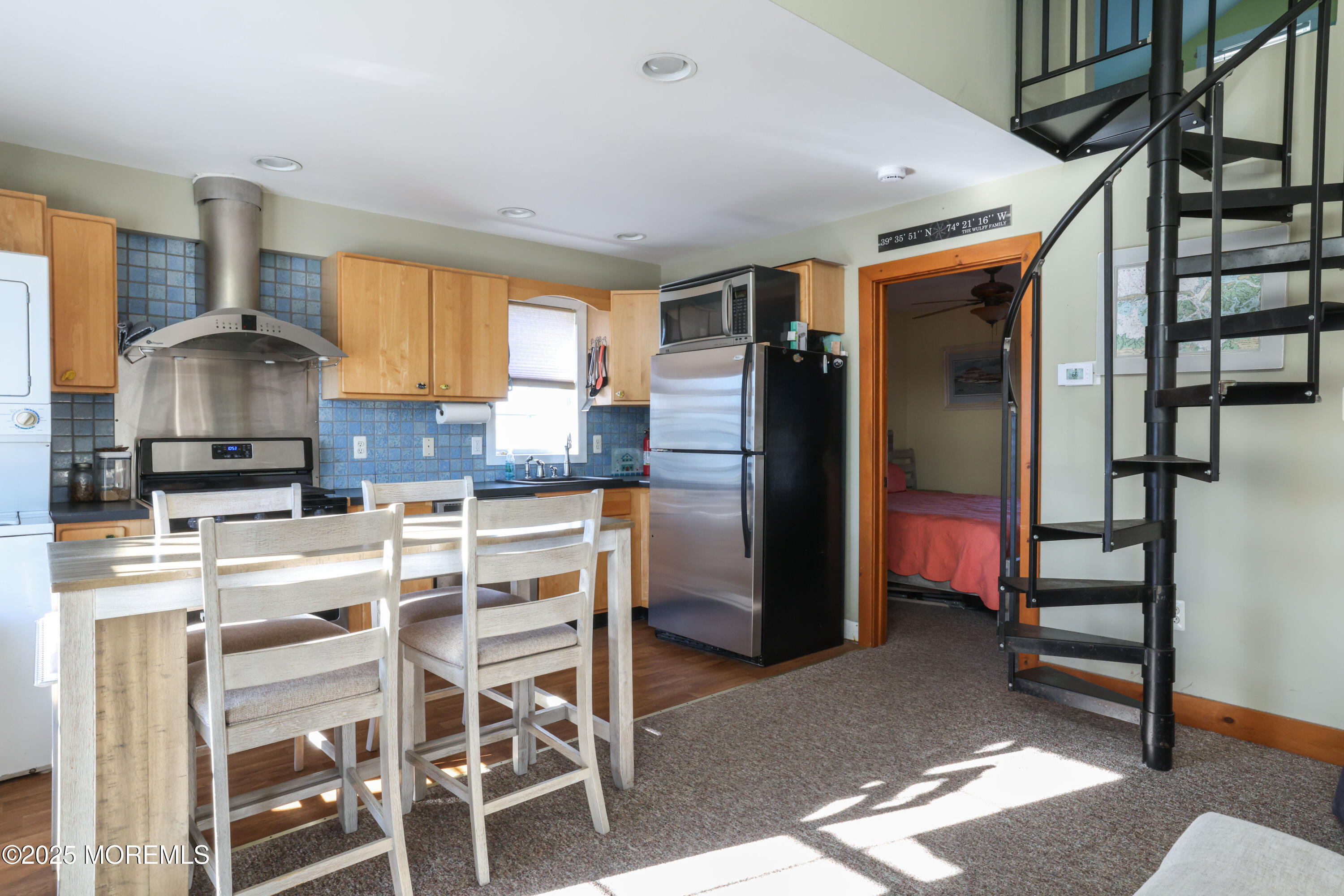 25 B Carroll Avenue Tuckerton, NJ 08087 - Photo 9 of 27 a kitchen with stainless steel appliances kitchen island granite countertop a refrigerator and a stove top oven