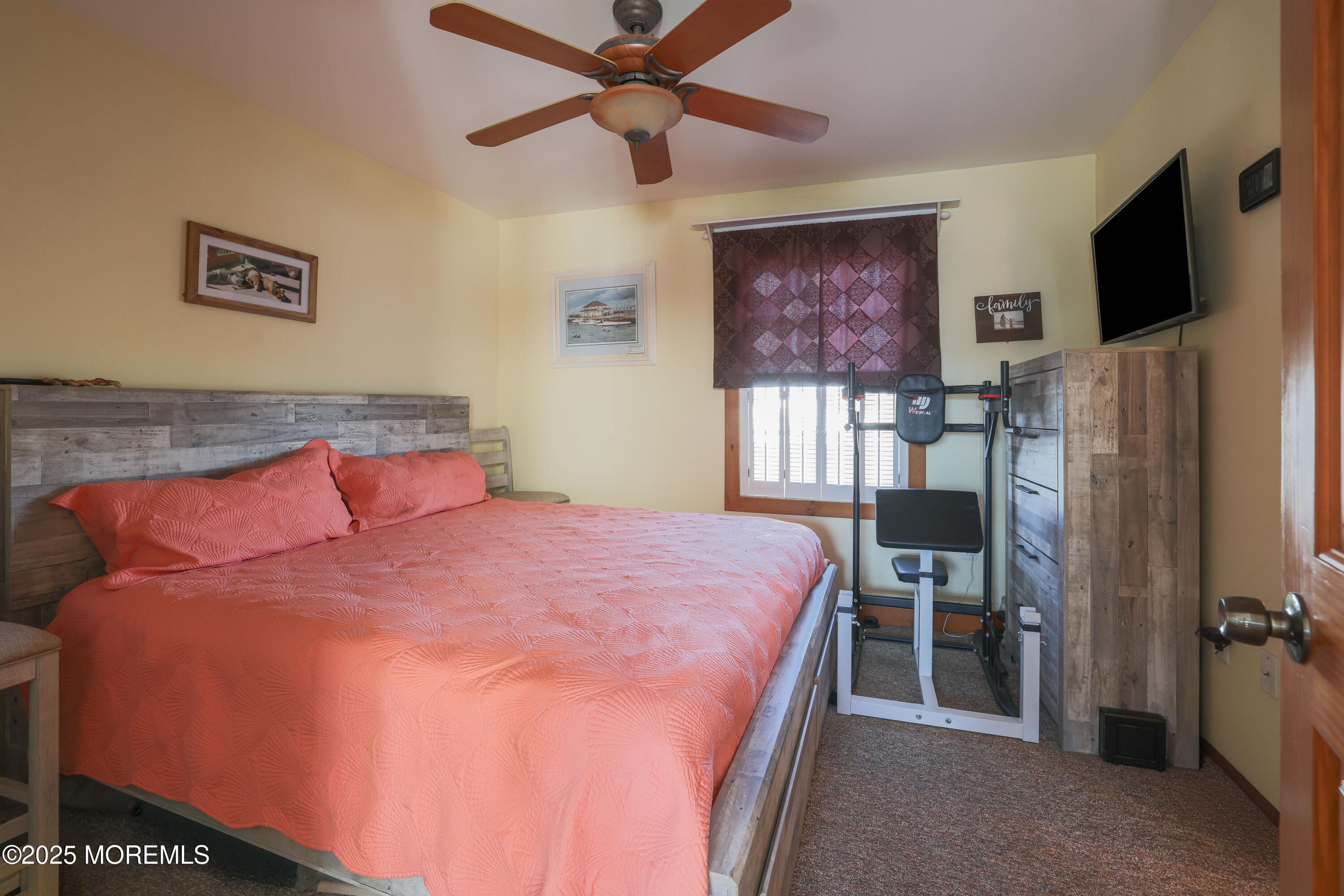 25 B Carroll Avenue Tuckerton, NJ 08087 - Photo 10 of 27 a bedroom with a bed and a flat screen tv
