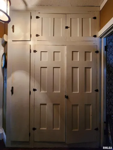 a bathroom with a toilet sink shower and mirror