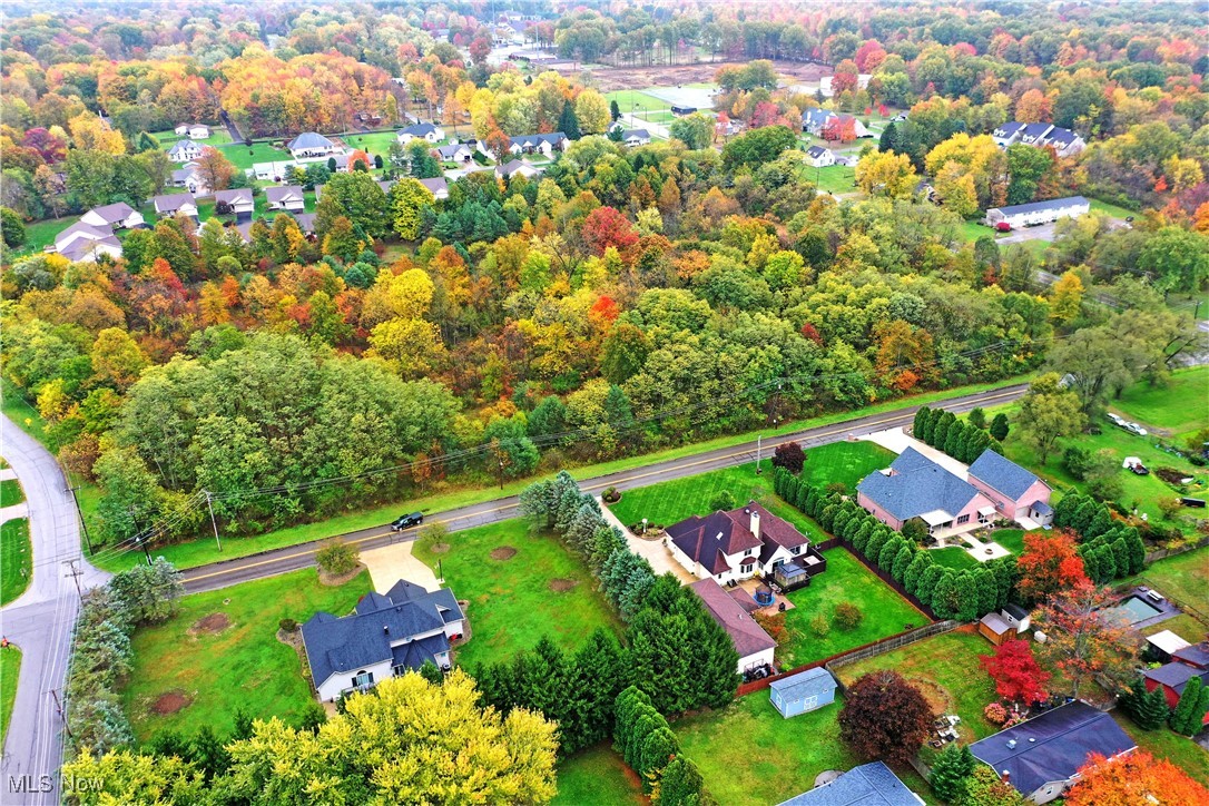 Hubbard Road Youngstown, OH 44505 - Photo 7 of 13 Aerial perspective of suburban area with a heavily wooded area