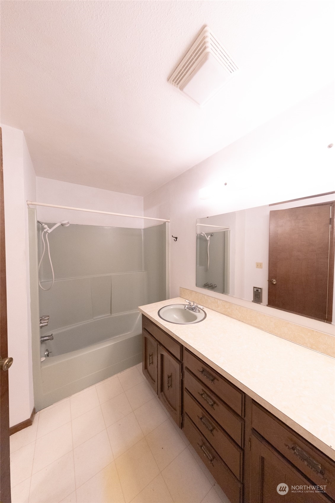 168 Chilvers E & F Road Chehalis, WA 98532 - Photo 17 of 29 a bathroom with a sink a shower and a mirror