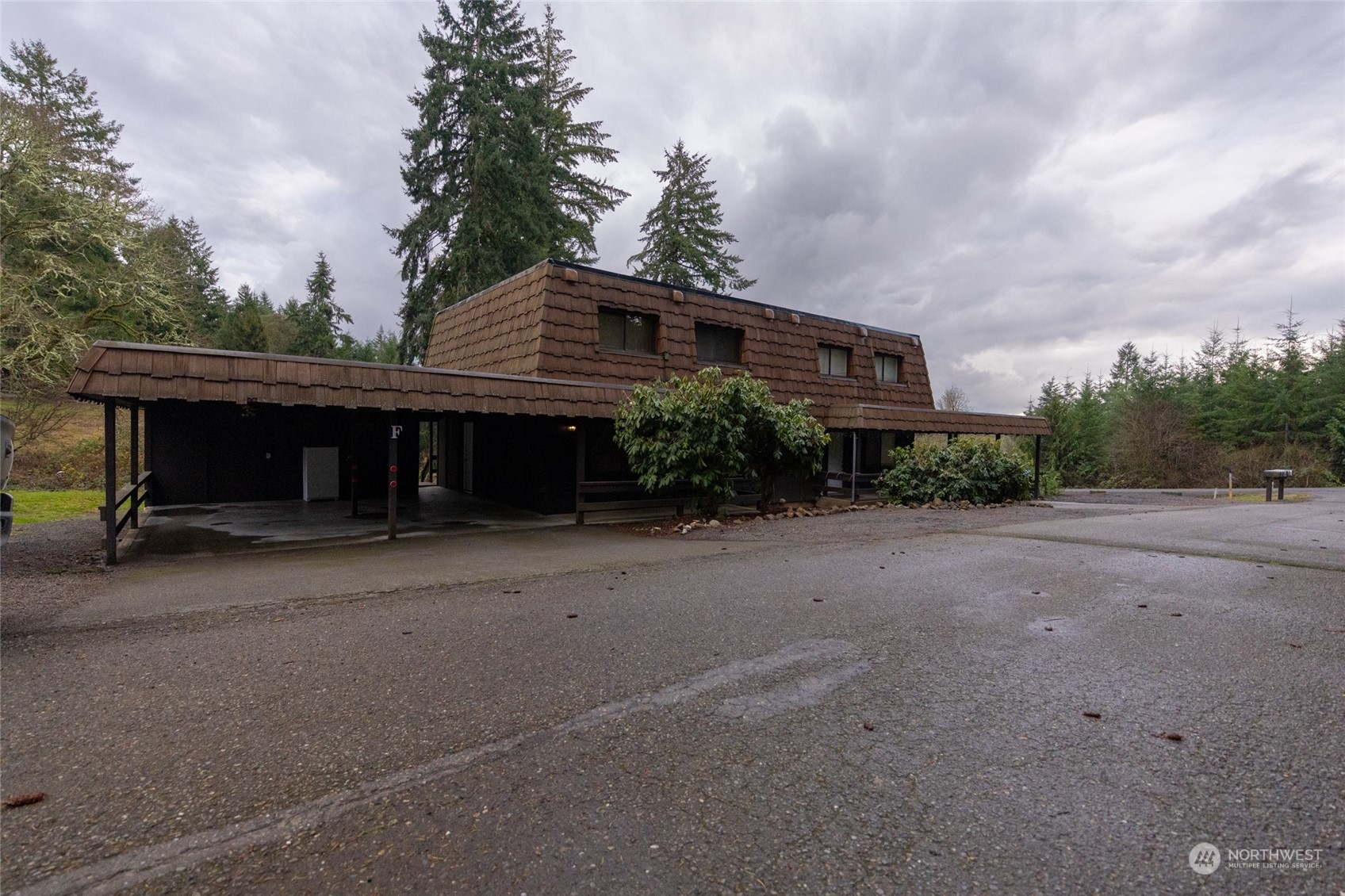168 Chilvers E & F Road Chehalis, WA 98532 - Photo 2 of 29 a front view of a house with a yard and garage