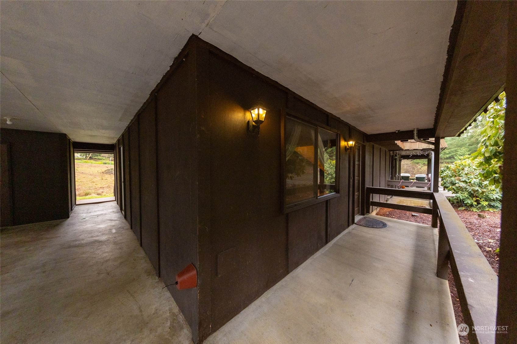 168 Chilvers E & F Road Chehalis, WA 98532 - Photo 25 of 29 a view of a hallway with wooden floor and a yard