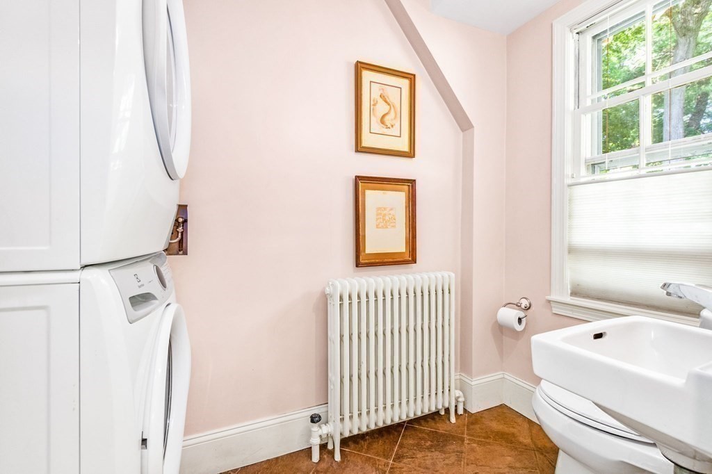 27 Whitney Road Newton, MA 02460 - Photo 15 of 32 a view of a bedroom from a bathroom