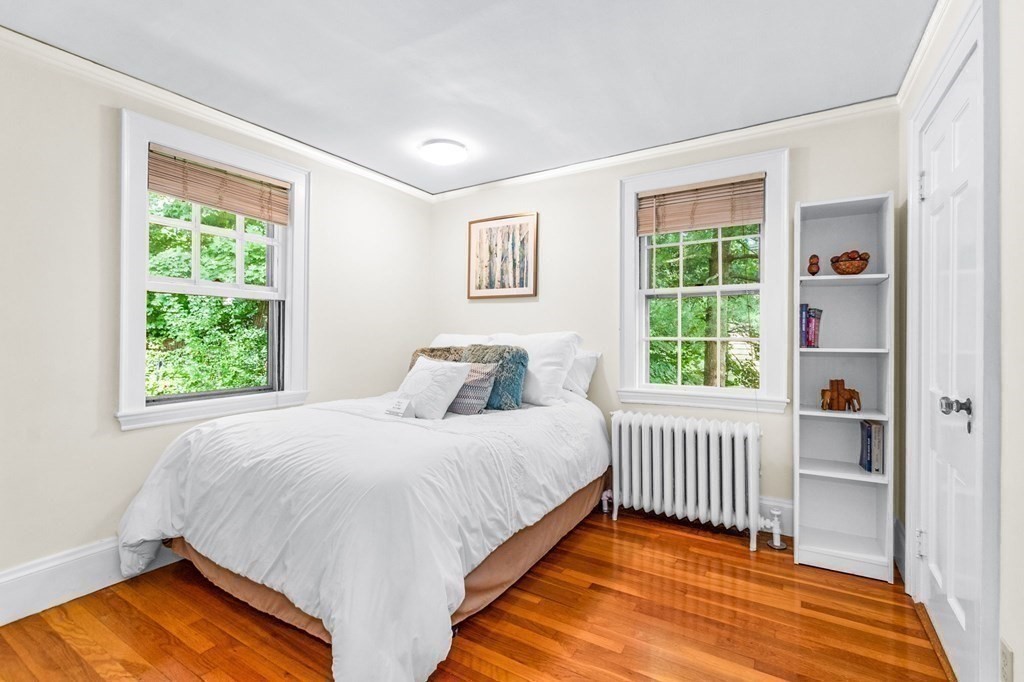 27 Whitney Road Newton, MA 02460 - Photo 19 of 32 a bedroom with a bed and a window
