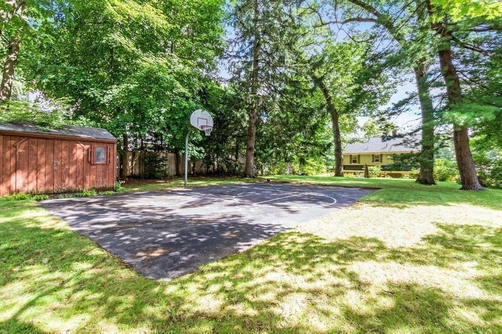 27 Whitney Road Newton, MA 02460 - Photo 30 of 32 a front view of a house with garden