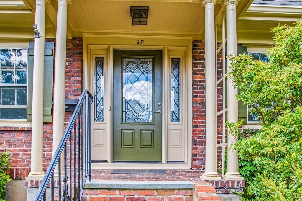 27 Whitney Road Newton, MA 02460 - Photo 3 of 32 a front view of a house with a garden